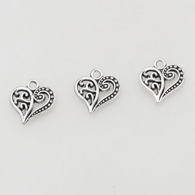 Personality Tibetan Silver Irregular Heart Hollow Pendant DIY Ornament Accessories